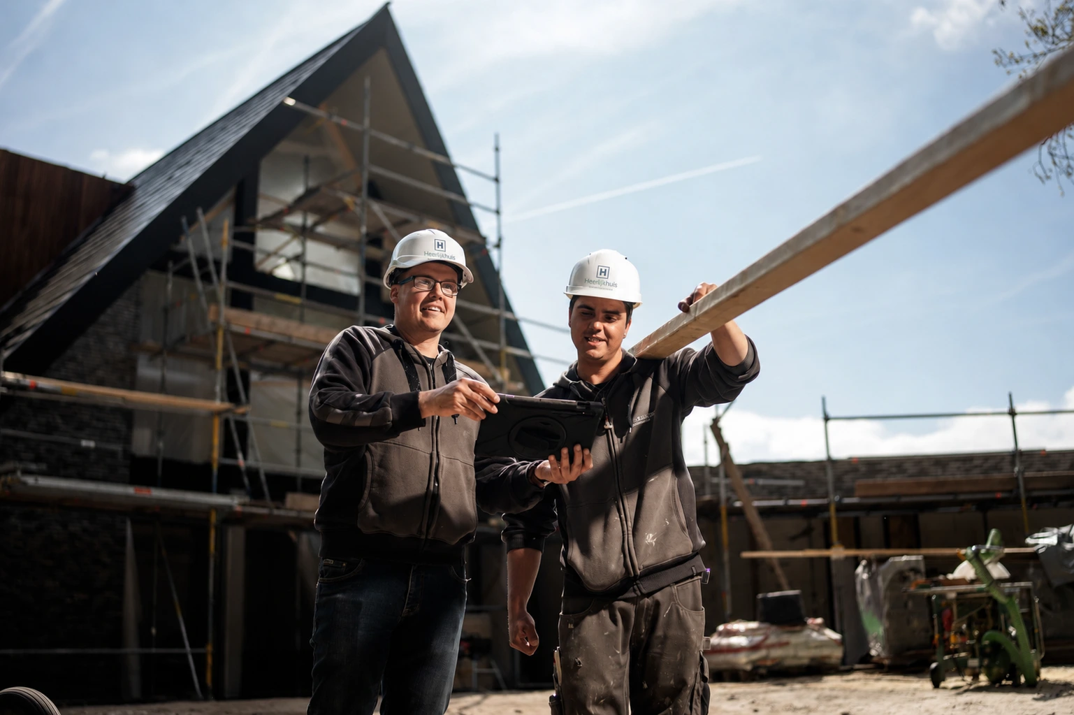 Heerlijkhuis timmerlieden op de bouw
